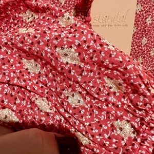 Adorable red dress with little gold accents. Purchased in Italy on vacation.